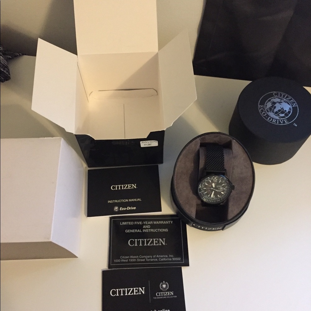 Citizen watch with box and paperwork